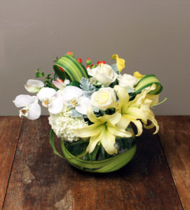 white and green flower arrangement for St. Patrick's Day. 