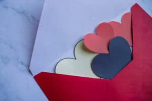 Loving letter, red envelope, purple, white, and red hearts